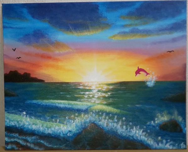 夕日の海とイルカ
